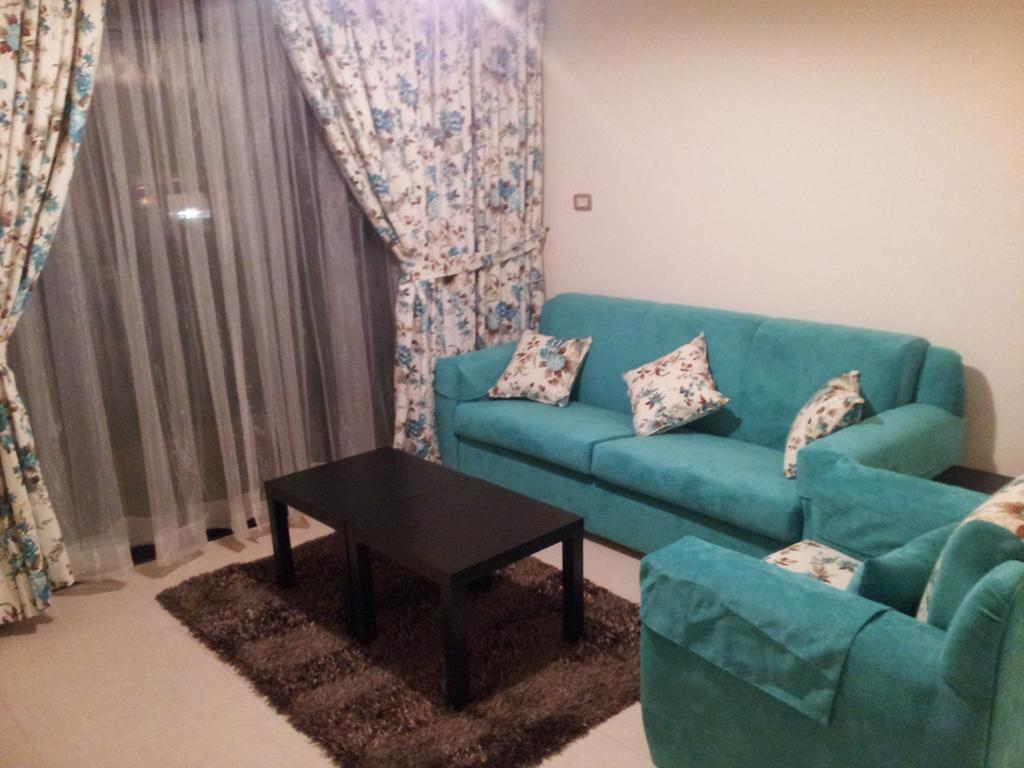 Cozy Dair Ghbar apartment Amman Bagian luar foto