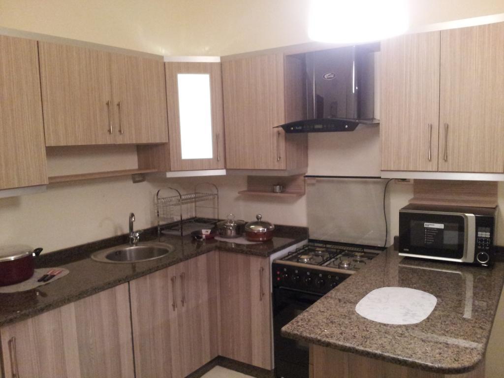 Cozy Dair Ghbar apartment Amman Bagian luar foto