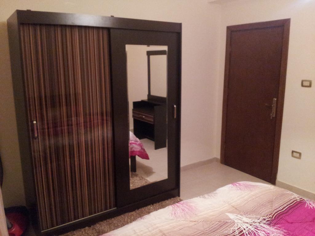 Cozy Dair Ghbar apartment Amman Bagian luar foto