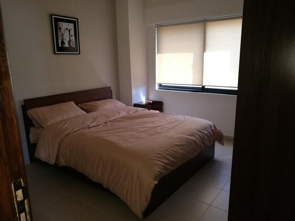 Cozy Dair Ghbar apartment Amman Bagian luar foto