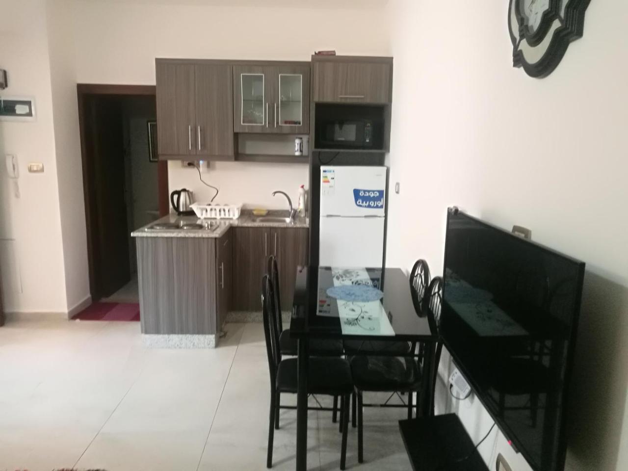 Cozy Dair Ghbar apartment Amman Bagian luar foto